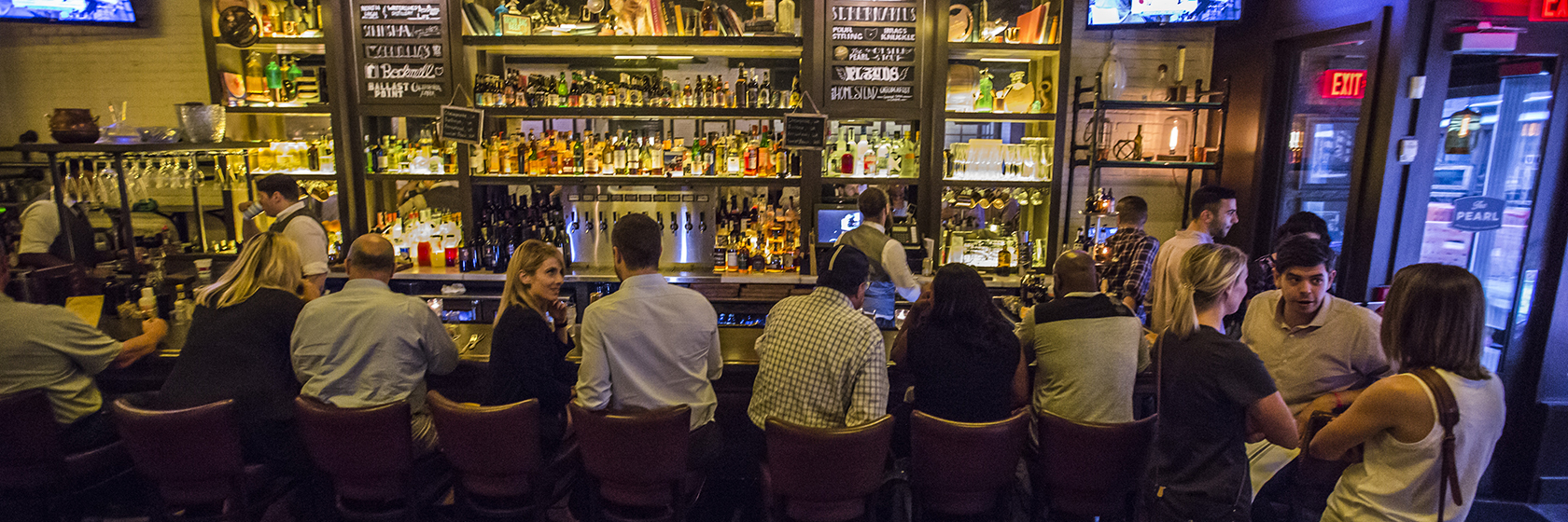 guests dining at bar