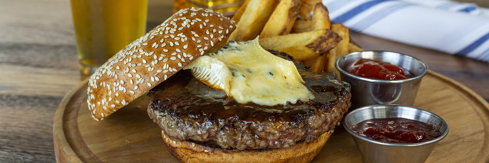 Pearl Burger with fries and glass of beer