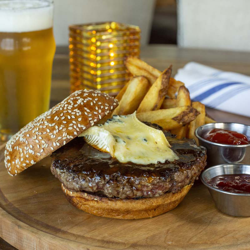 Pub Burger, fries and beer served at The Pearl